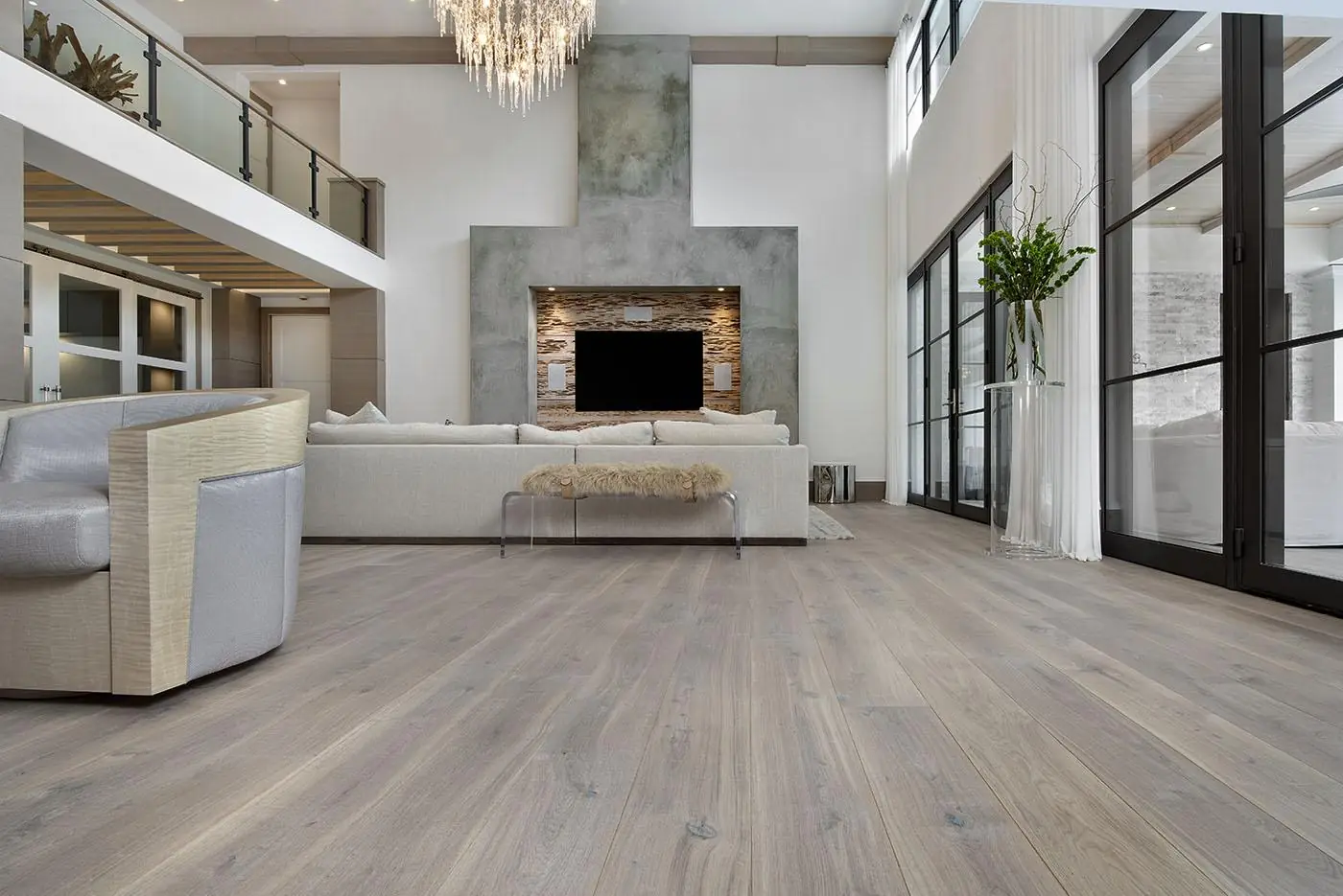 Weathered grey oak hardwood flooring in a two-story great room